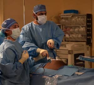 Dr. Khan is performing a laparoscopic inguinal hernia repair